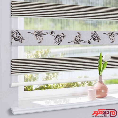 پرده زبرا کد 01-980030 رنگ آن سفید با گل و پلیسه قهوه ای سوخته و خطوط لمه طلایی براق می باشد.