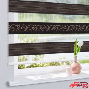 پرده طرح دار کد AP-04 با رنگ زمینه قهوه ای سوخته و طرح از دو ردیف خط های پیچ خورده و خط دار قهوه ای می باشد.