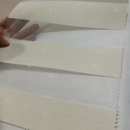 نمونه پارچه پرده زبرا ساده ریزبافت کد T2843، پارچه ای با بافت ریز و رنگ کرم روشن.