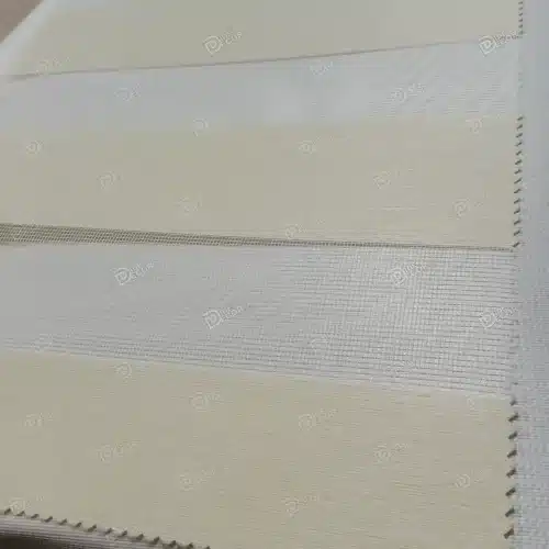 نمونه پارچه پرده زبرا کد T2843، پارچه ساده ریزبافت به رنگ کرم روشن برای هماهنگی با دکوراسیون منزل یا محل کار.