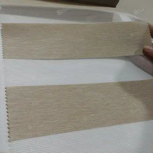 نمونه پارچه پرده زبرا ساده ریزبافت کد T2844 با پارچه نسکافه‌ای و کرم تیره، مناسب برای هماهنگی با دکوراسیون منزل یا محل کار.