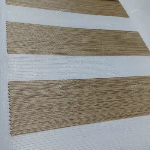 نمونه پارچه پرده زبرا طرح چوب کد T2845، ساده و بافت‌دار ظریف با رنگ کرم تیره و قهوه‌ای روشن